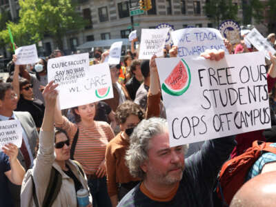 Columbia University professors demonstrate outside the Columbia campus demanding the release of students, in New York City on May 1, 2024.