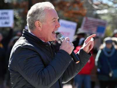 Sen. Chris Van Hollen gives remarks as protesters rally on President's Day at Lawyers Mall in Annapolis against the policies of President Donald Trump and Elon Musk, on February 17, 2025.