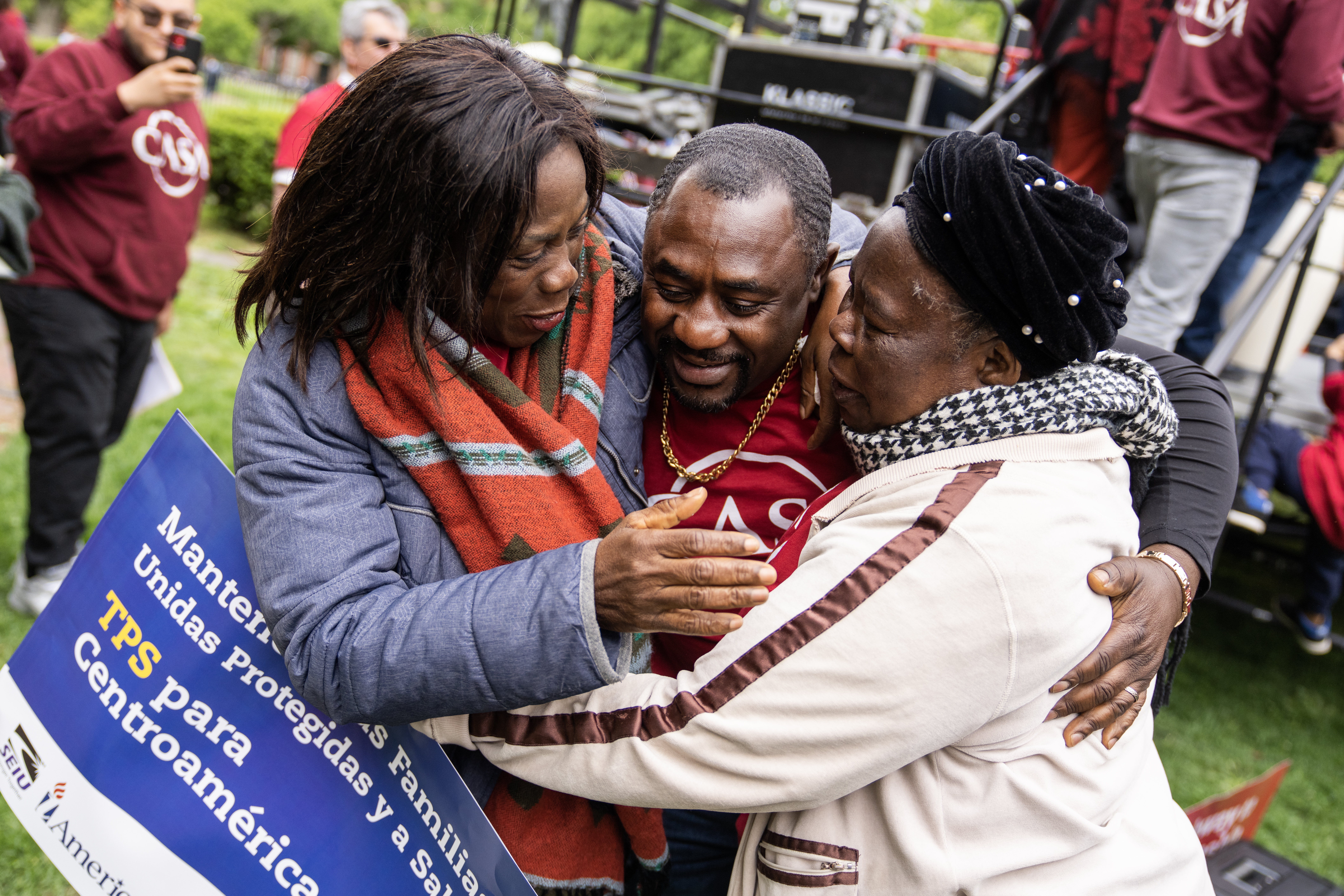 Denis, from Cameroon, is greeted by supporters after speaking during a rally with activists in Washington, D.C.'s Lafayette Park to demand Temporary Protected Status for immigrants from Nicaragua, Honduras, Guatemala, and El Salvador on International Workers Day on May 1, 2023.